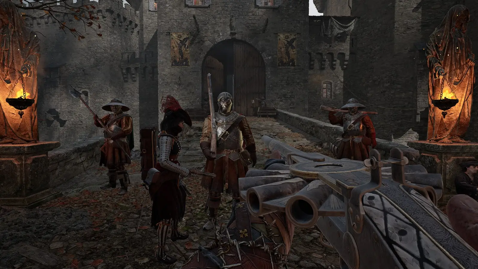 Mehrere Spielfiguren in einem Burghof in HUNGER